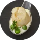 Гребінці у вершковому соусі на ложках